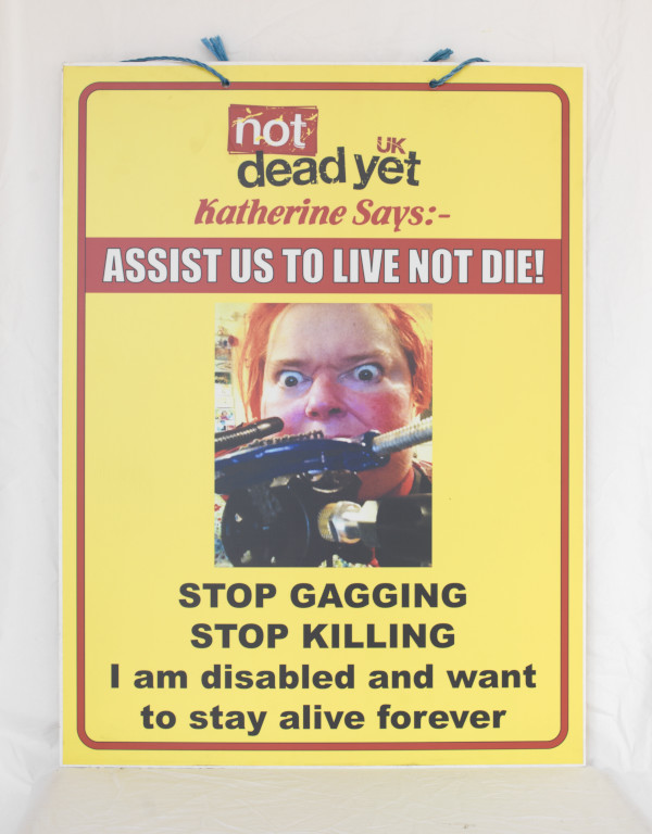 NOT DEAD YET PLACARD – Katherine Araniello